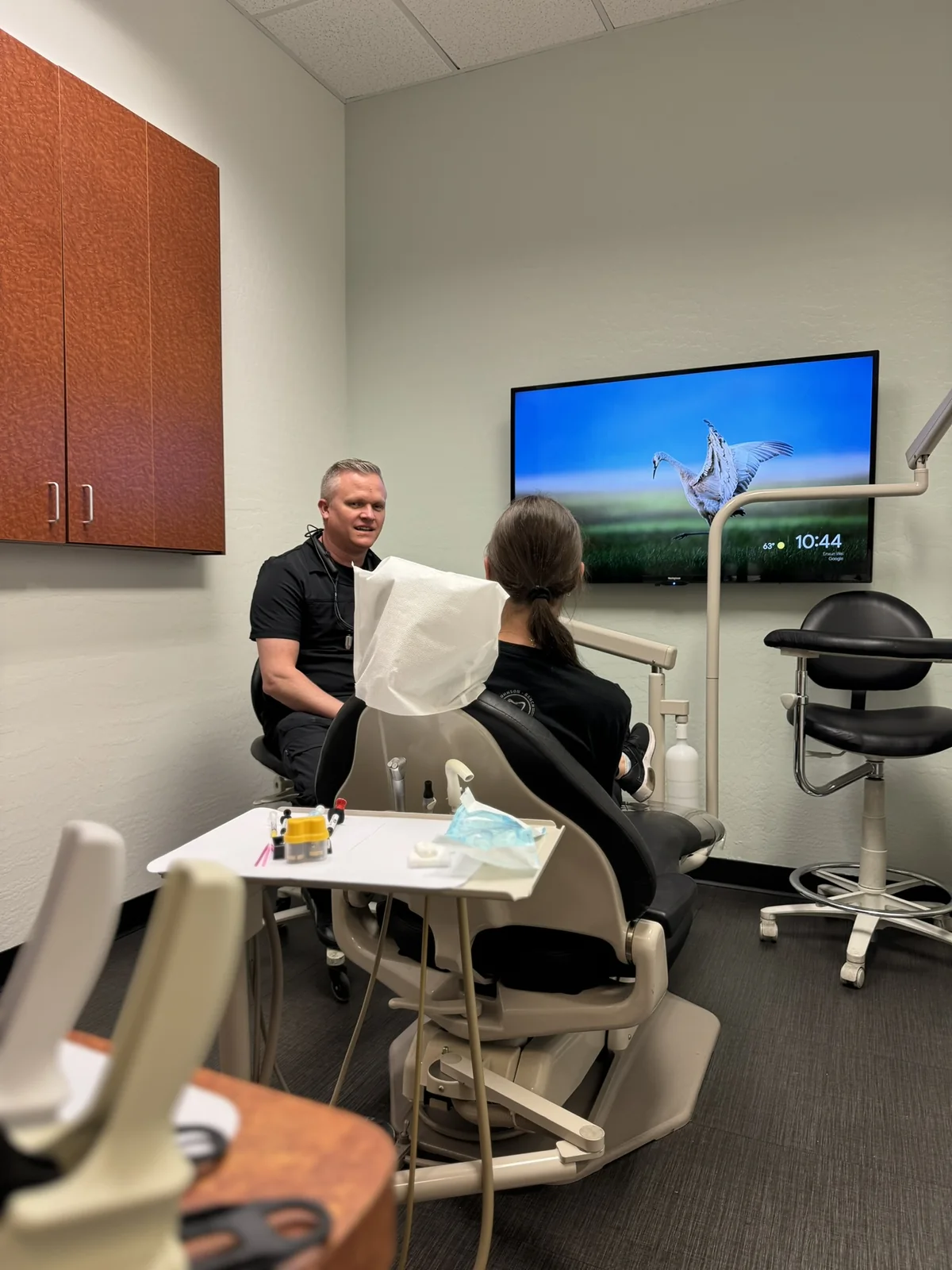 Dr. Hoopes listening to a patient during a consultation
